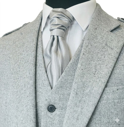 Close-up of tweed wool texture on men’s Argyll kilt jacket showing premium quality material