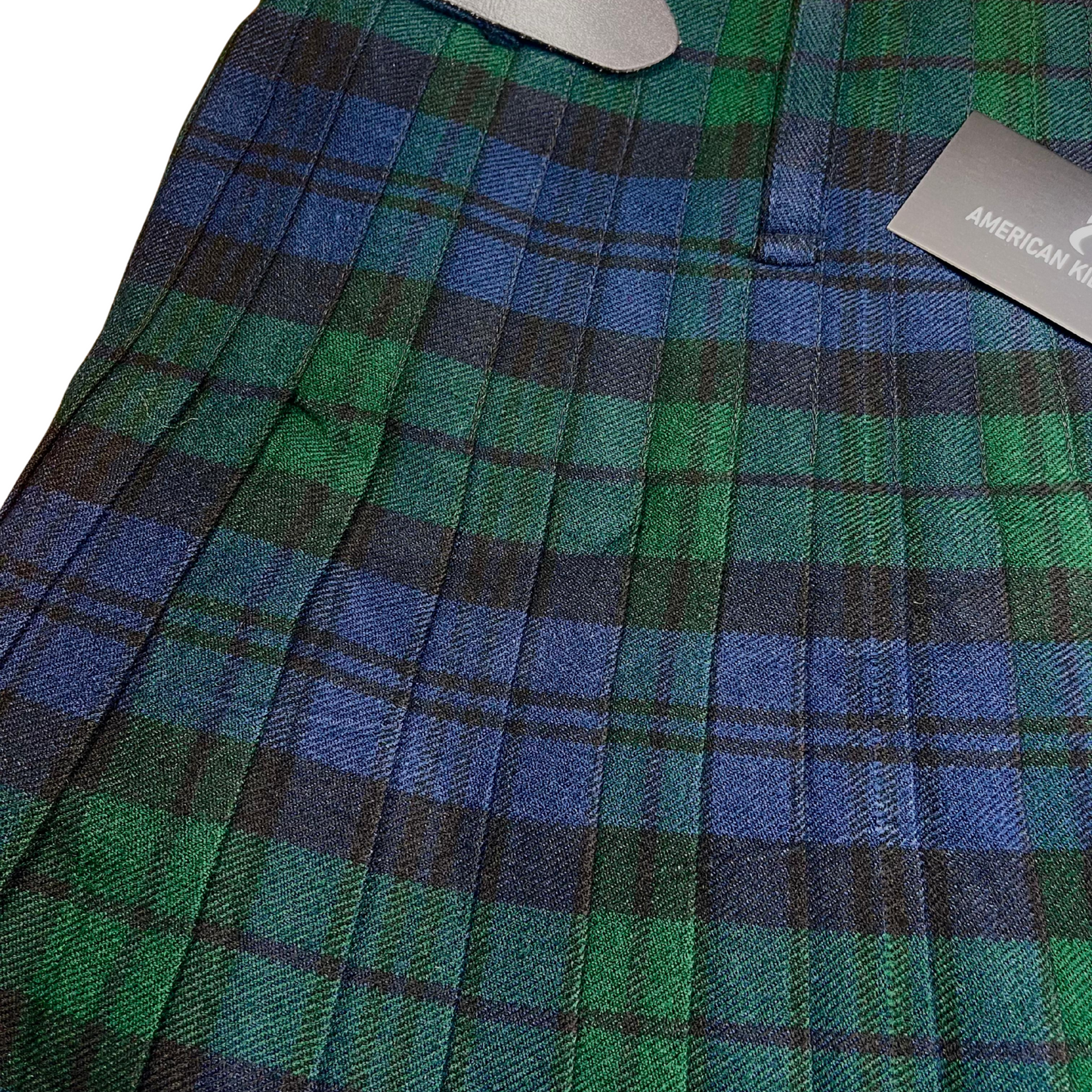 men’s Black Watch tartan kilt showing the traditional Scottish plaid pattern, fabric texture, and detailed Highland kilt construction.