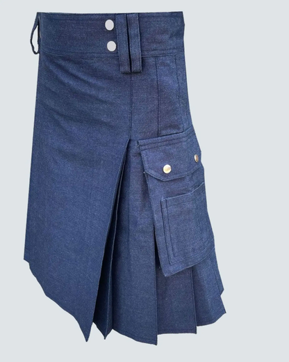 Front view of blue denim utility kilt showing reinforced denim construction, utility pocket detailing and a practical rugged workwear design.