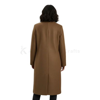 Back view of a female model wearing a camel wool blend long winter overcoat, showing the clean tailored back, full-length silhouette and classic winter coat design.