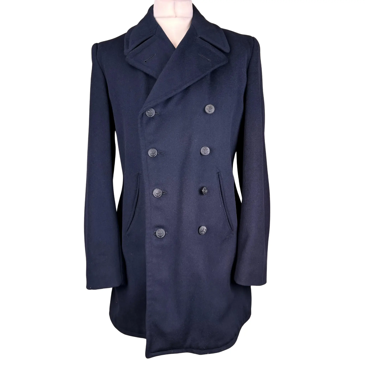 Front view of a German naval peacoat in heavy wool featuring a classic double-breasted button closure, structured collar and vintage military-inspired design.