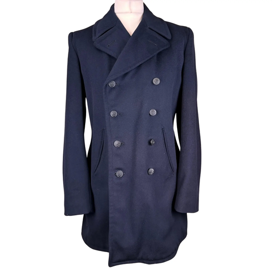 Front view of a German naval peacoat in heavy wool featuring a classic double-breasted button closure, structured collar and vintage military-inspired design.