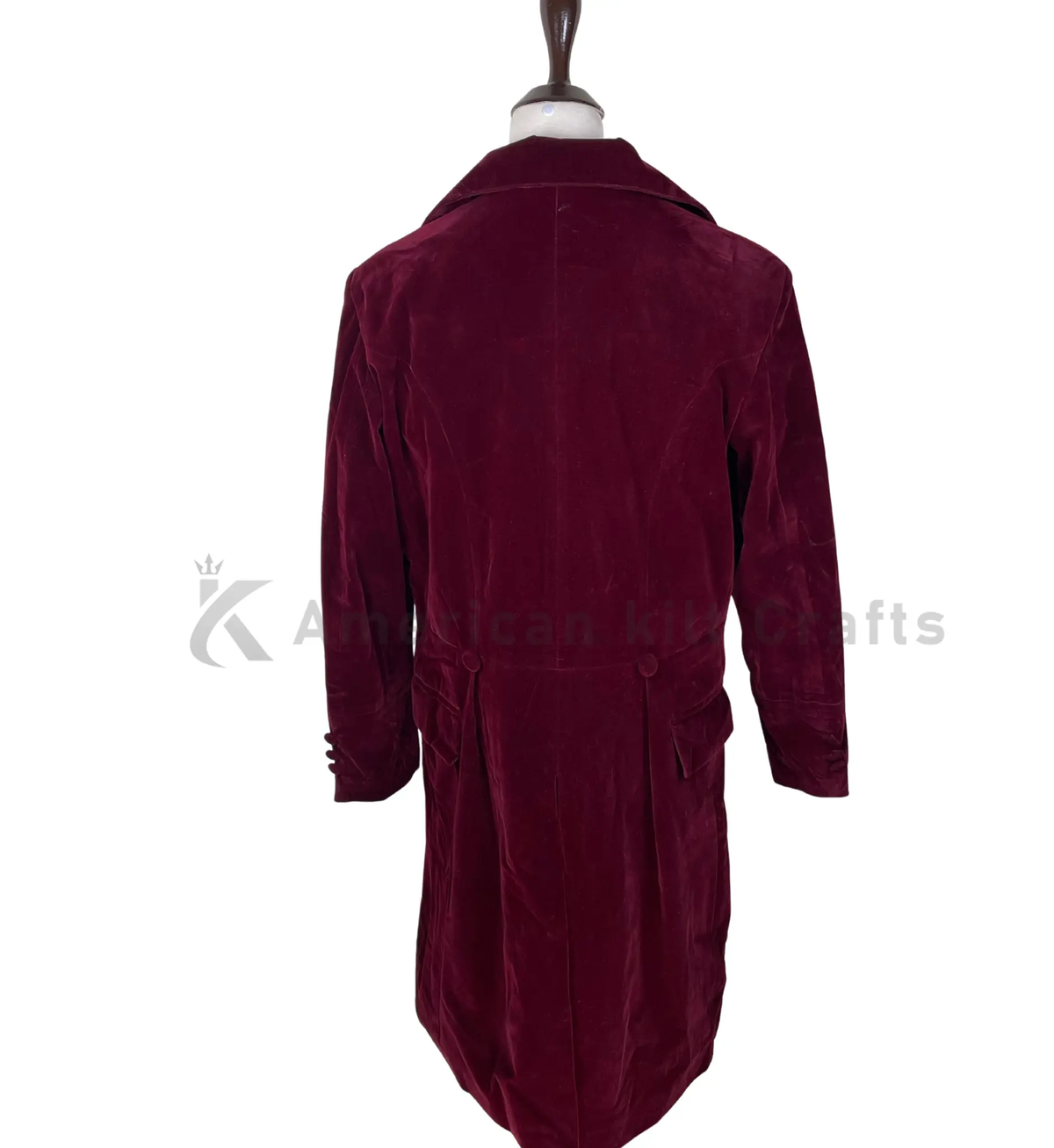 Back view of a maroon velvet sci-fi frock coat showing the long tailored back, structured shoulders and vintage-inspired great coat silhouette.