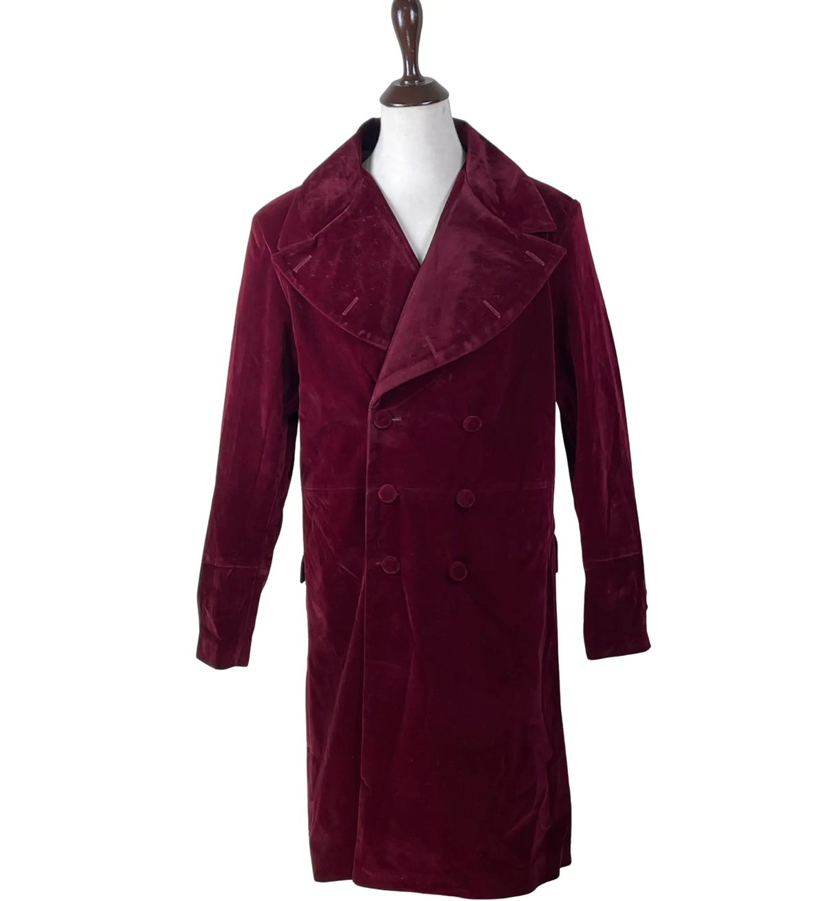Front view of a maroon velvet sci-fi frock coat featuring a vintage double-breasted closure, long tailored silhouette and statement great coat design.