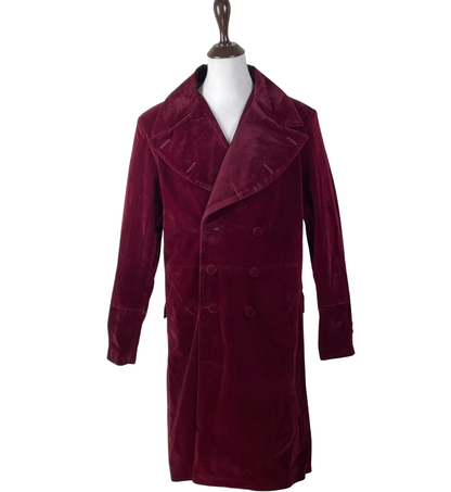 Front view of a maroon velvet sci-fi frock coat featuring a vintage double-breasted closure, long tailored silhouette and statement great coat design.