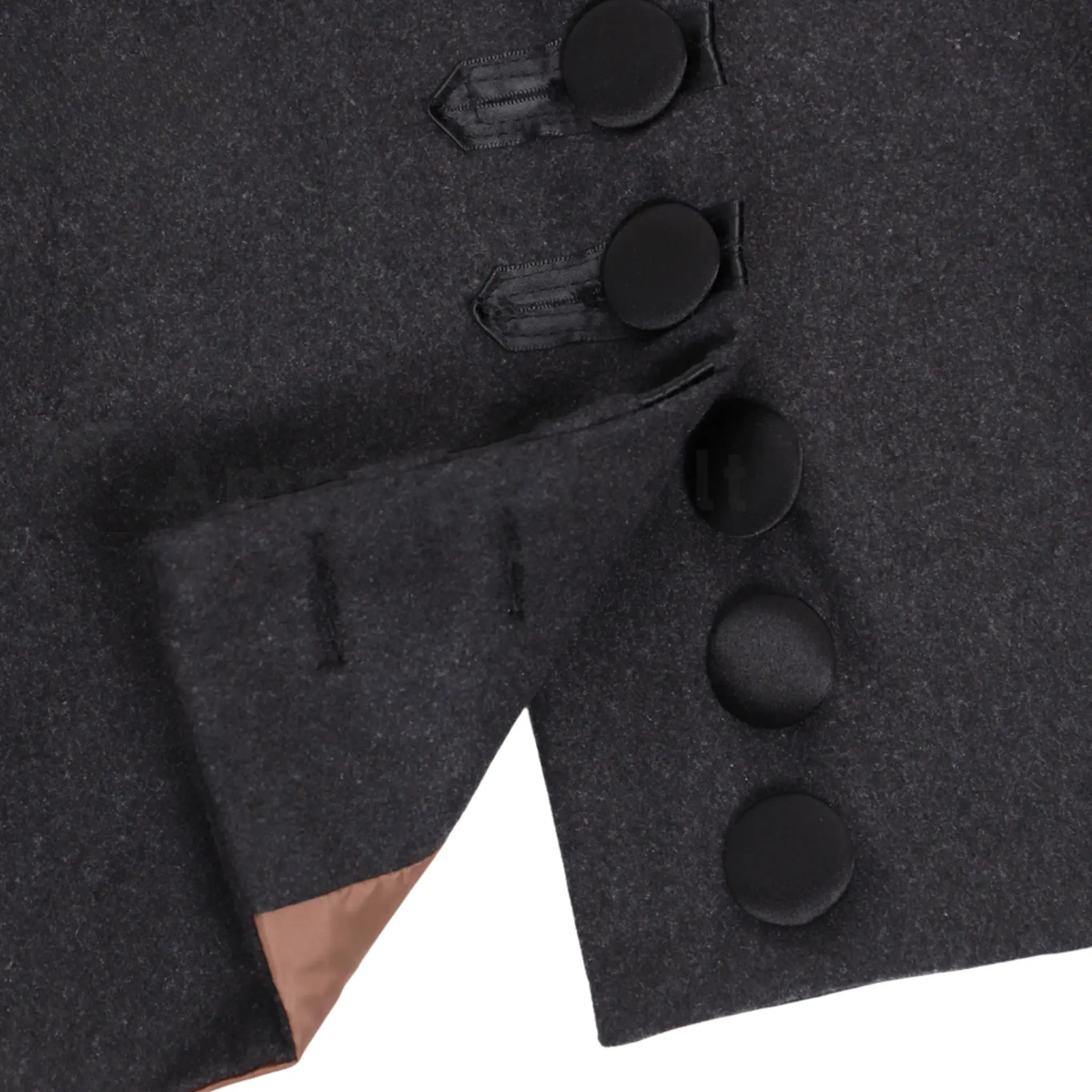 Close-up of a men's 18th century royal prince coat highlighting the ornate trim, buttons, fabric texture, stitching and luxury military-inspired craftsmanship.