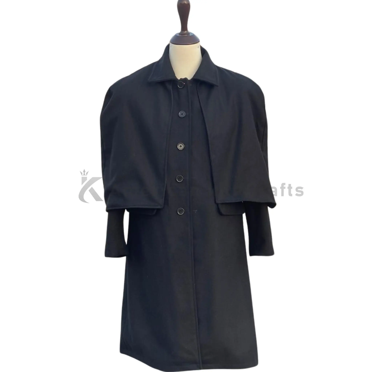 Front view of a men’s black wool Inverness cape coat featuring a Victorian-inspired Sherlock Holmes cloak design, layered cape detail and long overcoat silhouette.