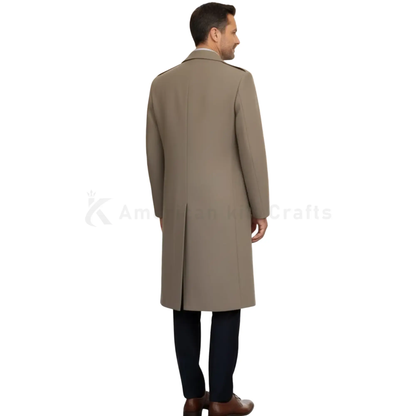 Back view of men’s British military heavy wool overcoat in chocolate brown with classic long greatcoat design.