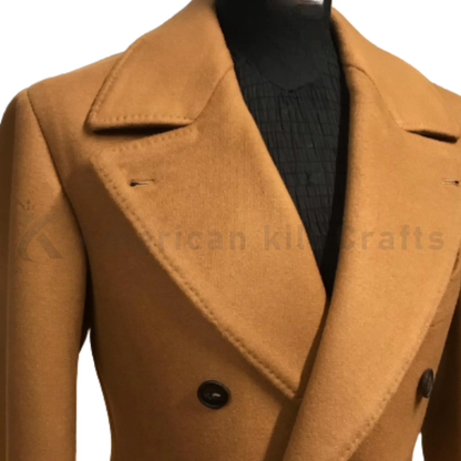 Close-up of men’s camel wool military overcoat showing the double-breasted buttons, structured lapels, textured wool fabric and refined tailoring details.
