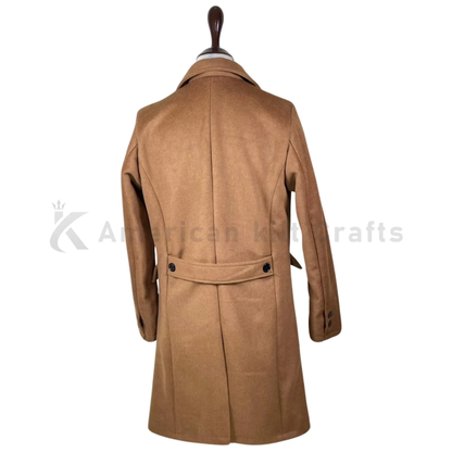 Back view of men’s camel wool British winter greatcoat showing the long tailored silhouette, structured shoulders, and classic overcoat construction.
