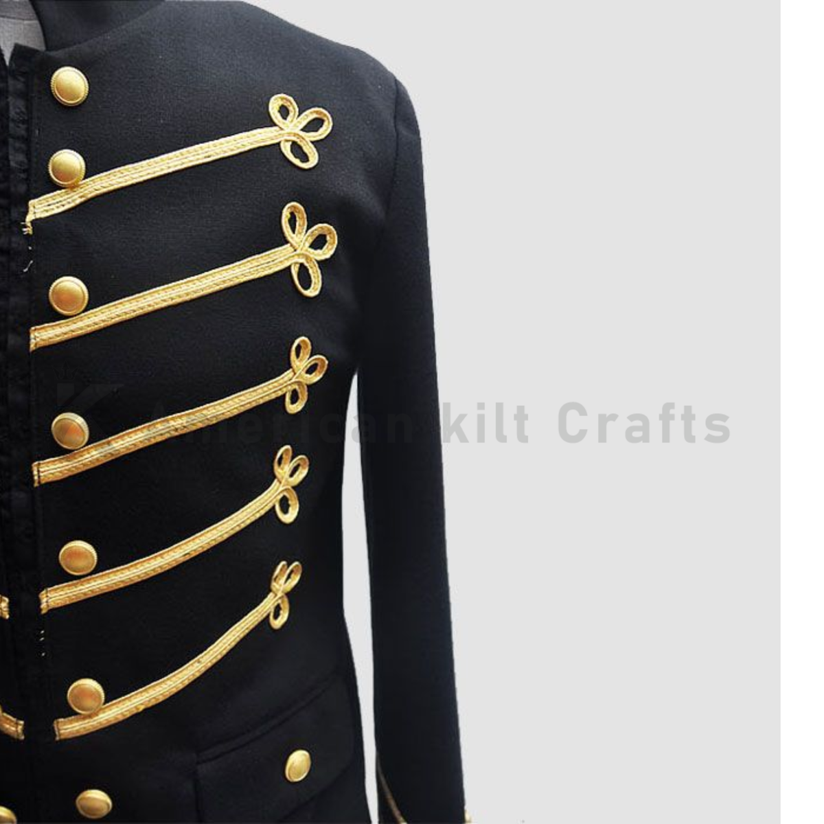 Close-up of men's black Napoleonic military jacket showing detailed gold braid, decorative buttons and premium uniform craftsmanship.