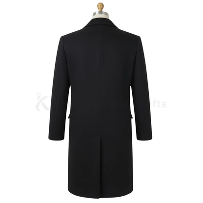 Back view of men’s vintage wool overcoat with clean tailored silhouette and Peaky Blinders inspired formal design.