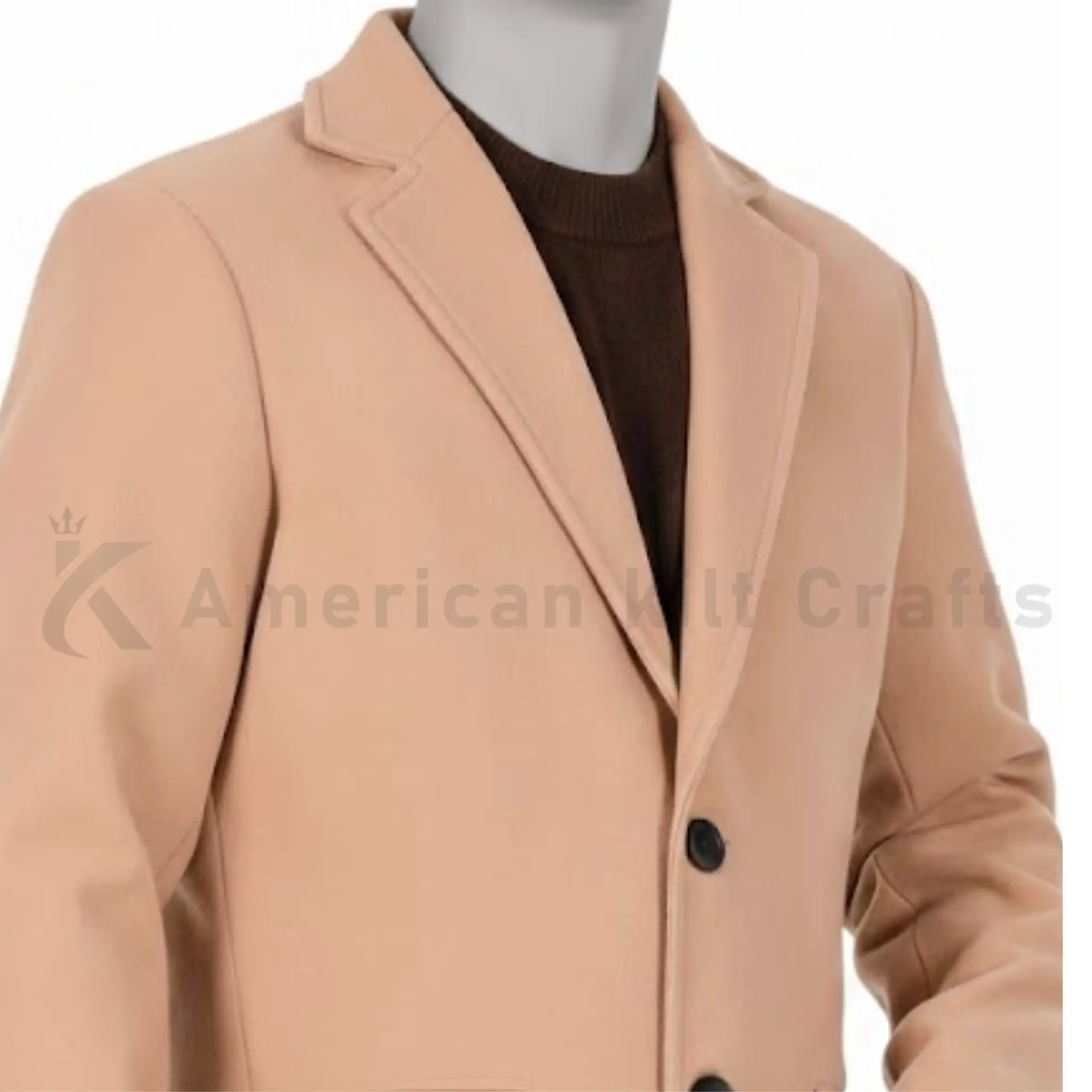 Close up of men’s wool blend peacoat showing fabric texture collar buttons and tailored details.