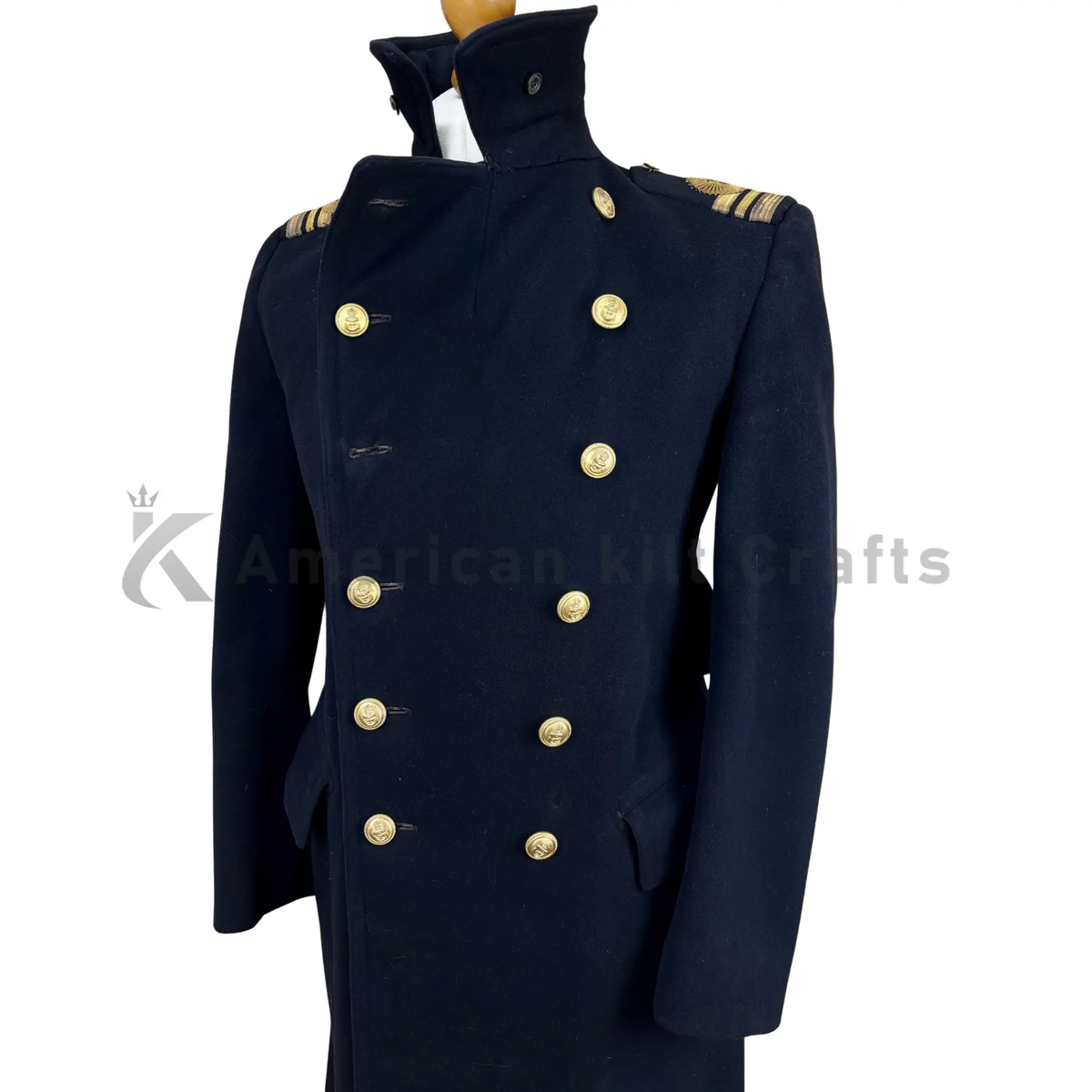 Side view of military navy blue double-breasted wool greatcoat with classic long 1943-inspired design.