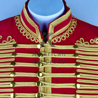 Close-up of gold braided detailing, decorative buttons, and ornate military trim on a men's red Hussar jacket.