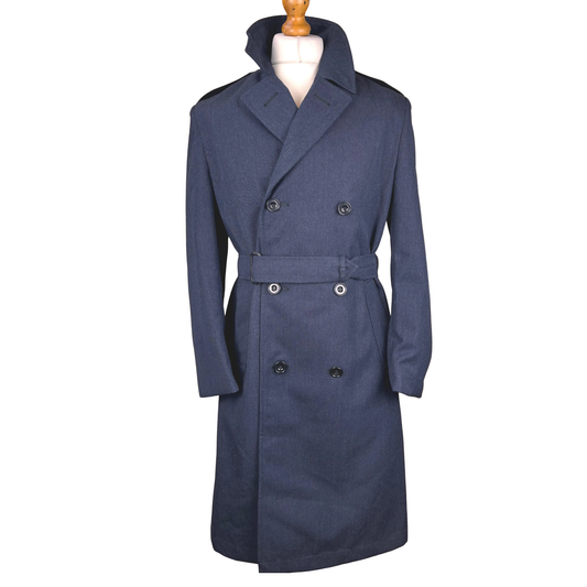 Front view of vintage military style navy blue double-breasted belted winter coat with classic tailored design.