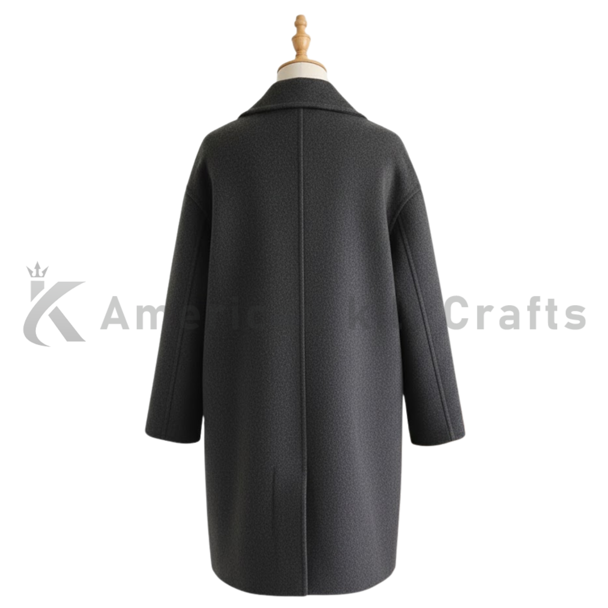 Back view of women’s double breasted long pea coat on model showing clean tailored shape and long winter overcoat length.