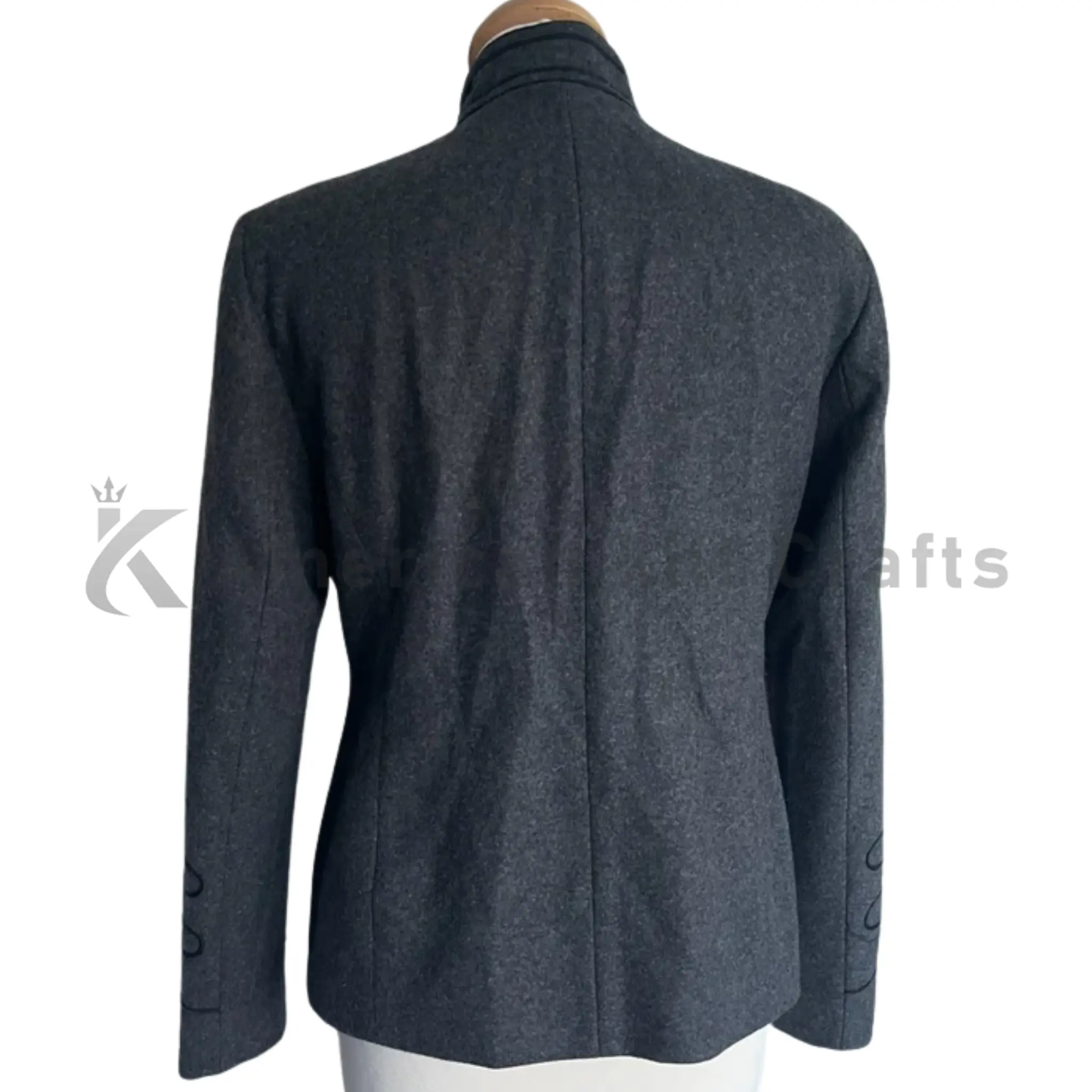 Back view of a women’s grey Victorian parade coat highlighting the structured tailoring, clean back design and military-inspired shape.