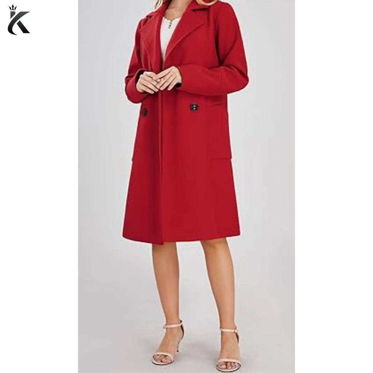 Model wearing of wool blend pea coat showing the tailored shoulders, clean structured design, and elegant mid-long winter overcoat silhouette.