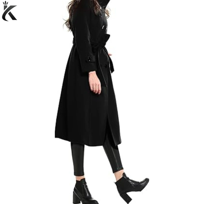 Side view of women’s wool trench coat featuring a long tailored silhouette, waist belt, structured fit, and classic double-breasted winter coat styling.