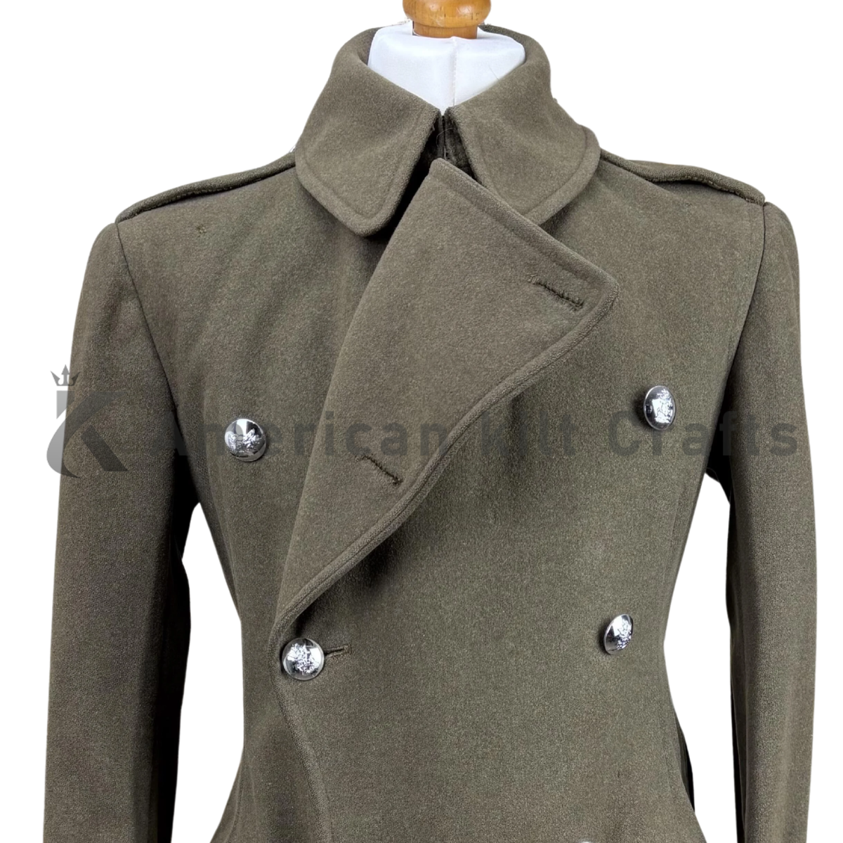 Close-up of WWII vintage army officer wool greatcoat highlighting the double-breasted button detailing, wool fabric texture, stitching, and military-inspired craftsmanship.